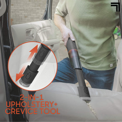 Lightweight Handheld Vacuum With Crevice Tool & Storage Dock feature 2-in-1 upholstery and crevice tool being used in a car